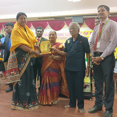 Our beloved Principal receiving the Best Principal Award from the Correspondent Dhanalakshmi Engineering college